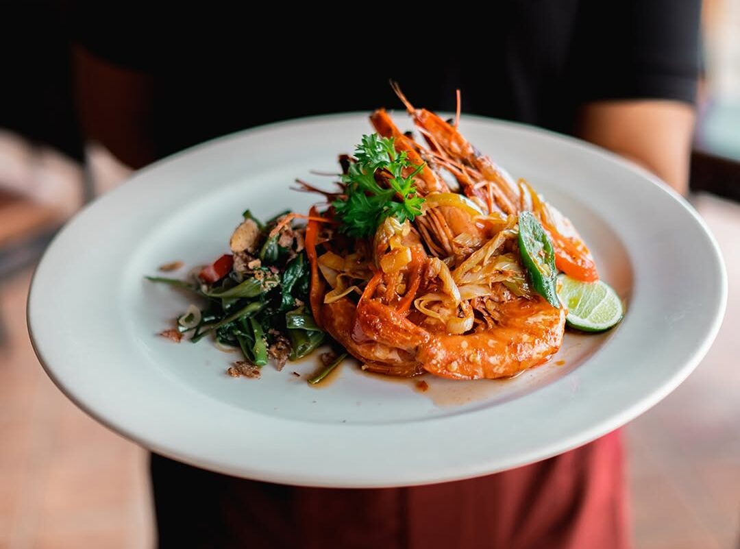A little spicy, perfectly crisp prawns, and a whole lot of delicious. Every bite steals the spot
